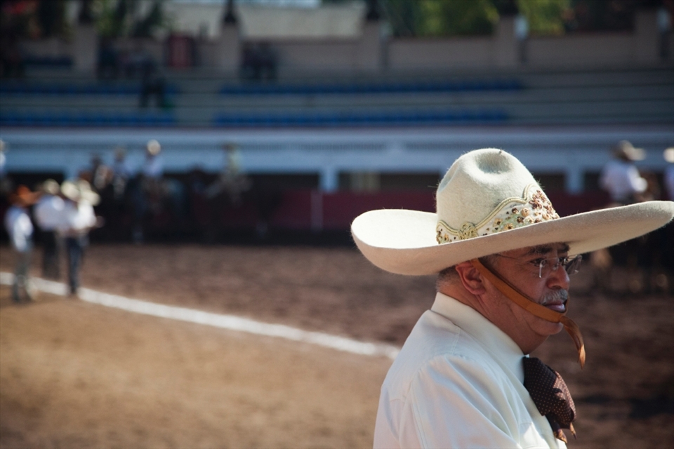 The eldest watching a team member perfoming the 