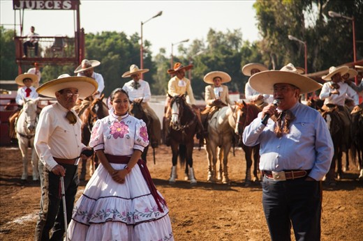 The president of La Catedral de la Charrería being thanked next an 