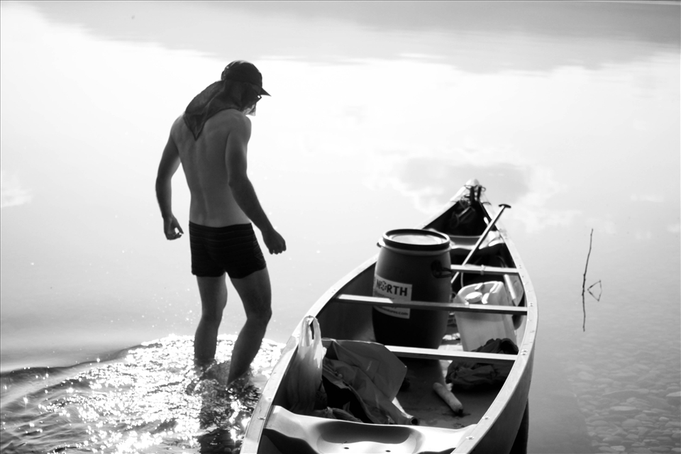 Unpacking the canoe after a day of paddling.