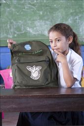 A young girl girl tells her teacher why she will not eat turtle eggs while proudly showing her 