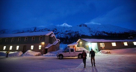 Dusk at the Cantung Mine, with Mount Tungsten lit up in the background. 