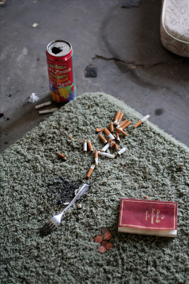 What was at one point in time a hotel for only the most elegant people, is now a place where the homeless can go to escape the cold and find solace. Various rooms are strewn with old mattresses, torn blankets, loose change and in most cases, a bible.