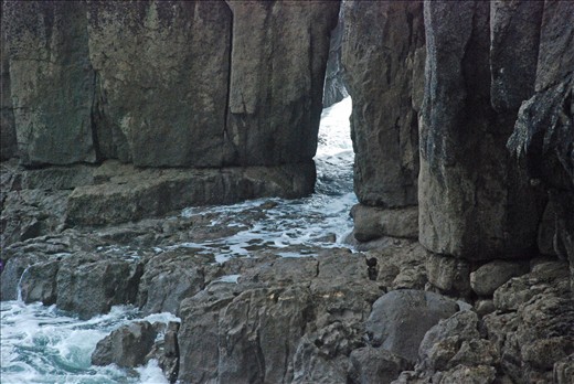 Tide water coming in at this time, slipping through over these rocks, 