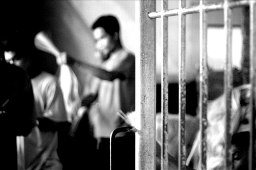 inmates making nylon strings to sell at the market