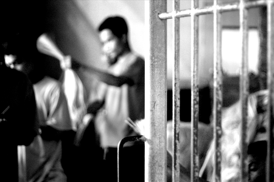 inmates making nylon strings to sell at the market