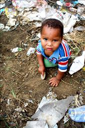 Zamma's son Bushgle(4) plays with a sharp rusty tin lid in his backyard. R.I.P : by jessmoyamacleod, Views[242]