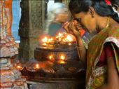 A devotee focused only on the worship of her deity at Meenakshi Temple.: by jessnewell, Views[331]