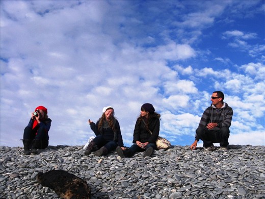 Carefree. A group of my friends on a pebble beach where we stopped for a breather during a road trip. Perhaps I love this photo because I can see in it each of their personalities, but I think even for someone who doesn't know them the photo shows a laid-back playfulness and a sense of good times and togetherness. 