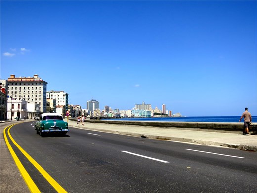 Along the Malecon: The Malecon is a beautiful sweeping highway that runs the length of Havana's waterfront and is often referred to as the collective living room of Havana. 