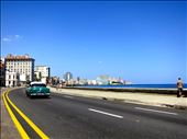 Along the Malecon: The Malecon is a beautiful sweeping highway that runs the length of Havana's waterfront and is often referred to as the collective living room of Havana. : by jetsettingadventurer, Views[481]