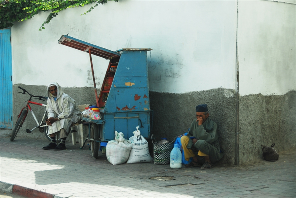 Even street sellers claim the traditional blue of the city