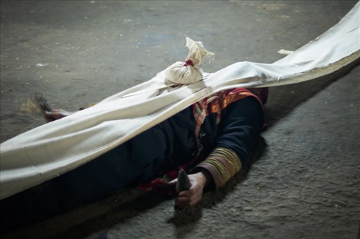 The local Hmong people are superstitious and believe that the spirits have a part in affecting ones health. I was fortunate to witness a shaman ritual called a ua neeb kho in a local home to thank the spirits for returning the health to the father of the home who had recently recovered from illness. 

The ritual involved a variety of offerings, hypnotic chanting, a chicken sacrifice and the shaman entering a state of trance, where in that period it was forbidden for anybody to move around in between the shaman and the altar which is a permanent fixture in most homes.