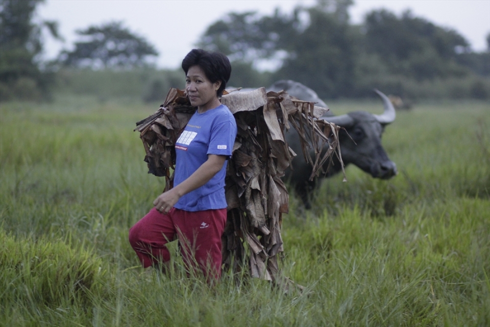 Residents of Bibiclat in Aliaga, Nueva Ecija in the Philippines dress up with dried leaves and cover themselves with mud in honor of St. John the Baptist every June 24.
