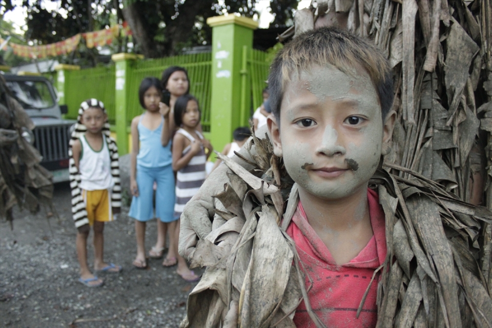 Children also cover themselves with mud and dried leaves in celebration of the feast more popularly known as Taong Putik Festival.