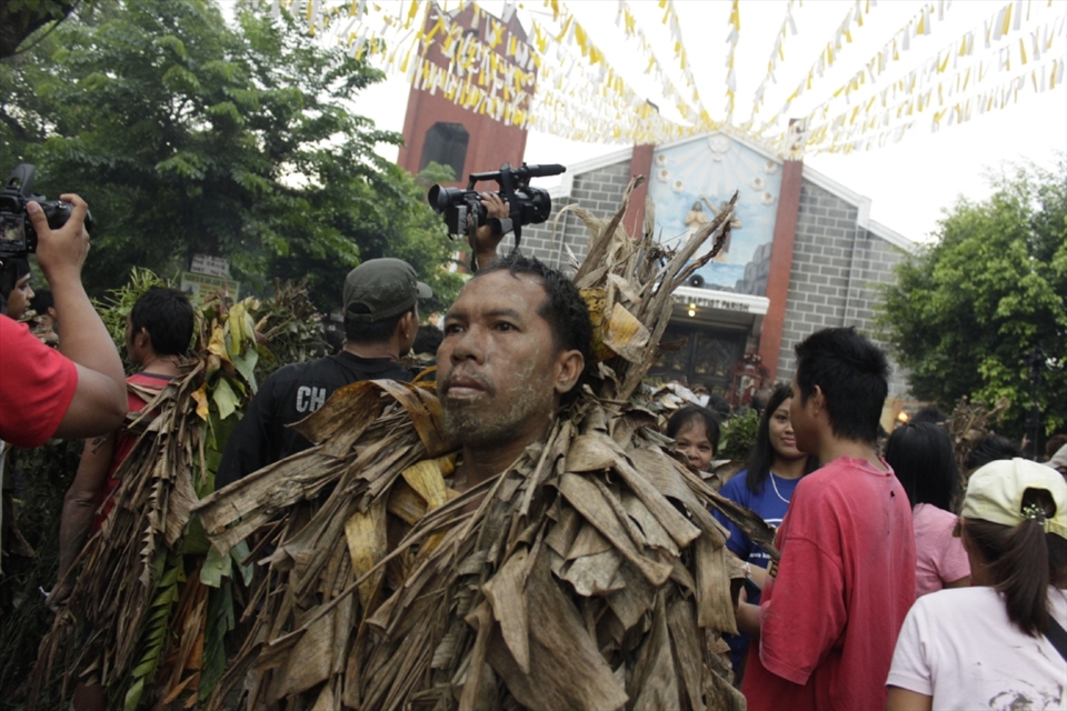 The devotees converge at the church before sunrise to celebrate the first mass of the day. 