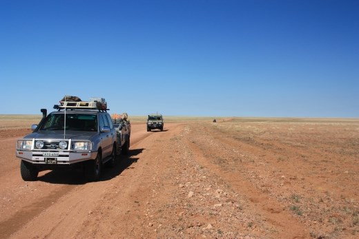 View back from a rise on a vast treeless plain on the way out to the Diamantina NP
