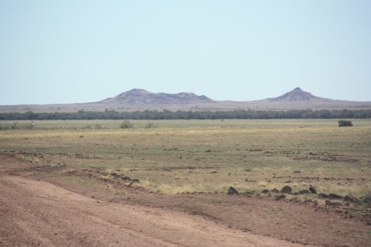 One of the few standout features on the plains, Three Brothers Ridge on the left and Mount Dot on the right