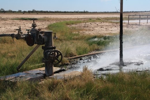 Water gushing from a fractured pipe at a bore - the water was in excess of 60 degrees!