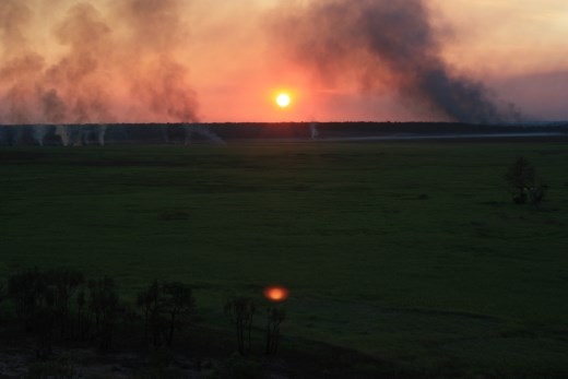 The sunset over the wetlands from Ubirr Rock - the glow in the foreground is lens flare 