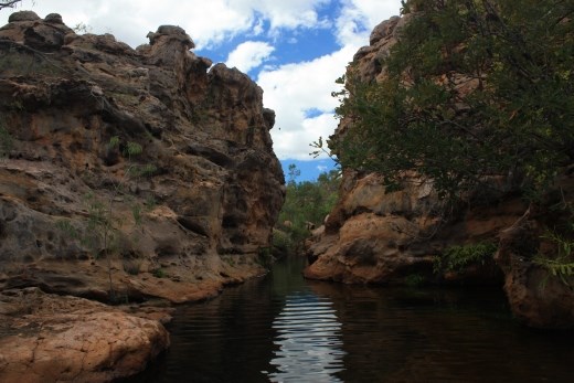 The pool at Nanny's Retreat cuts a narrow path between rock walls