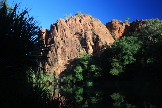 An early morning view of the start of the first gorge with the reflections in the mirror like water