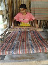 Weaving a traditional pattern into a textile in the self proclaimed kingdom of Boti in Western Timor a woman continues the traditional practices of this small isolated community who shun modern amenities and organized religion.: by jmitchell, Views[1005]