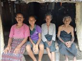 Traditional tattoos applied to show marital status give way to modern 'Live Strong' bracelets as 3 Generations of women sit outside their home in the village of Kletek in West Timor in the far eastern reaches of Indonesia's East Nusa Tengarra province. : by jmitchell, Views[1067]