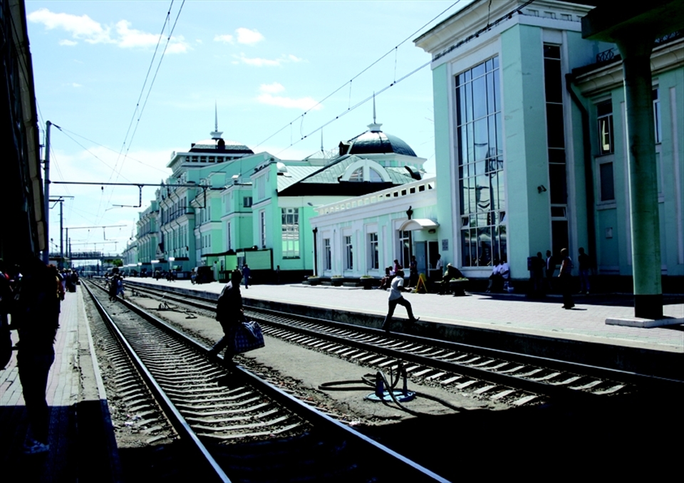 Locals using the tracks as a makeshift footpath but making sure to keep up their speed!
