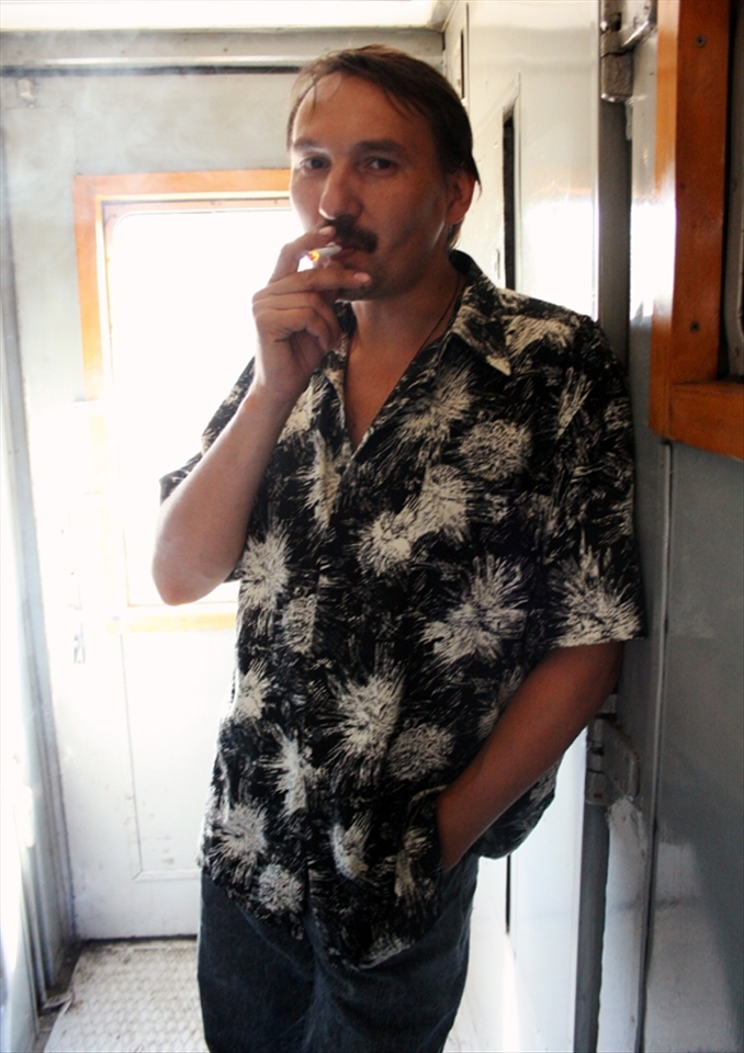 A fellow Russian passenger I met and befriended whilst aboard the train. Alexandra was a farmer from a village near Lake Baikal whom invited me to go tiger hunting. A very funny and interesting character. He also loved A shot of vodka at 7am.