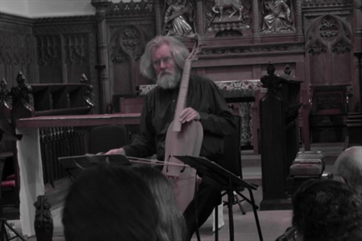 Roy Marks playing a renaissance viol at York Early Music Festival