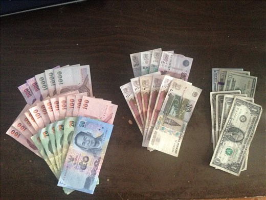 Thai Bahts, Russian Rubles, and US Doll Hairs
