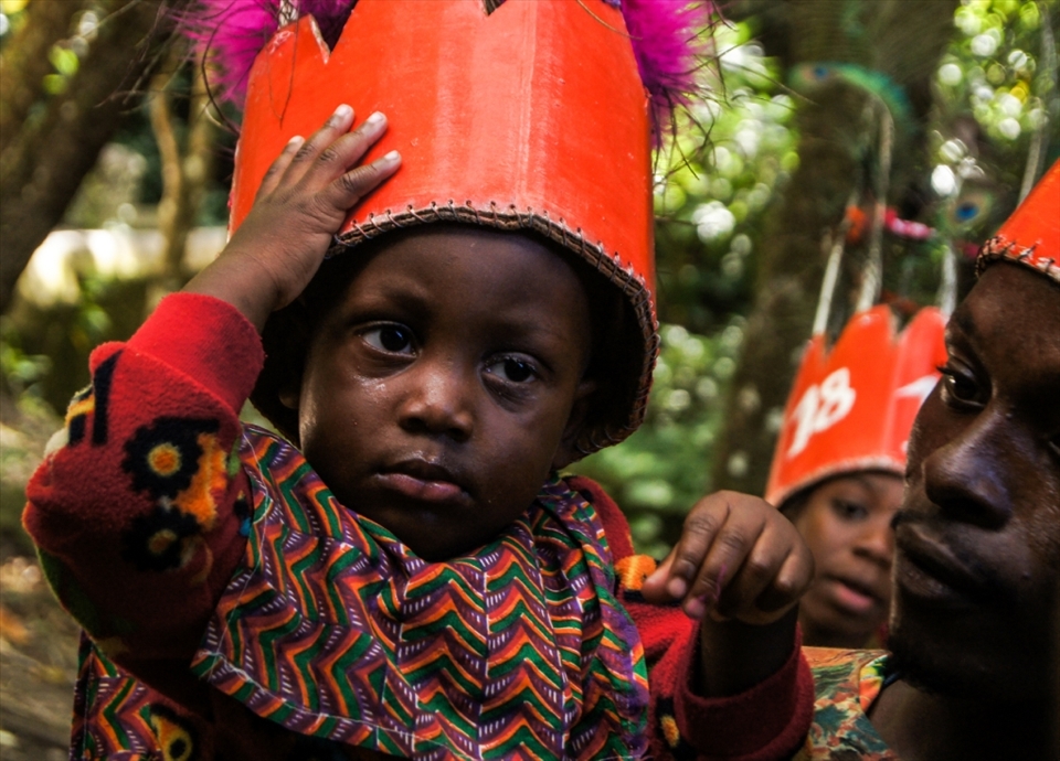 This family from St. Kitts dances with colours to the tourists. Even the smallest member of the family works hard to give a good show. Here you can see one of the smallest member exhausted after dancing for the tourist. It was such a wonderful experience to get to meet them and to see how hard they work for a living.
