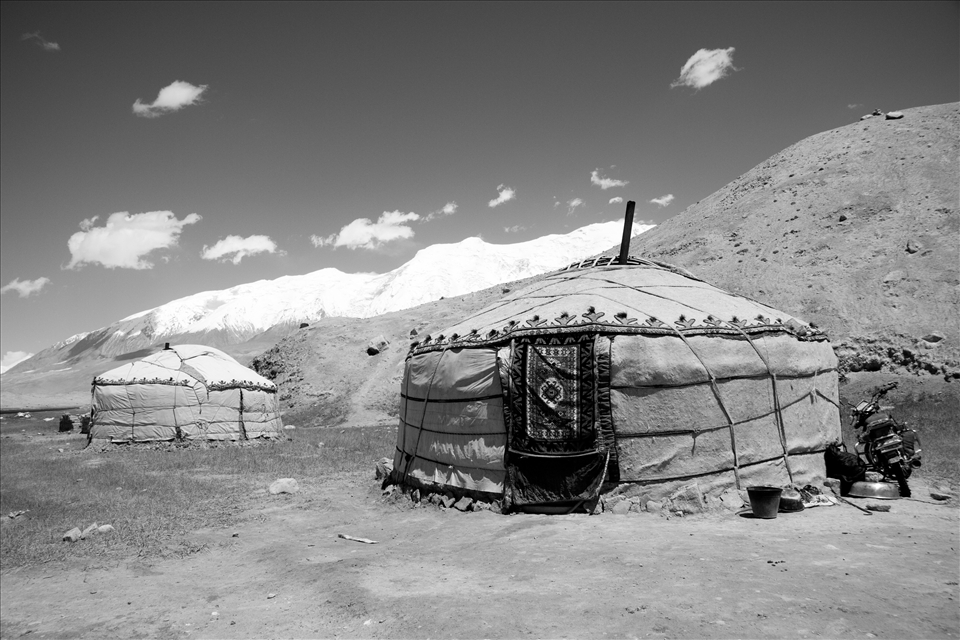 Along the Karakorum highway in China sits an isolated village of Kyrgyz Yurts on the edge of Lake Karakul. 