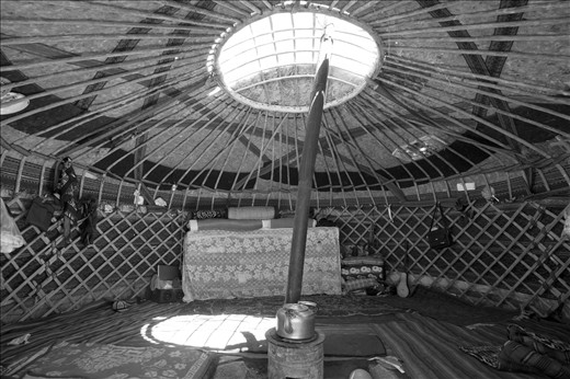 He invites us inside to meet his family and see his home. Almost everything inside the yurt was made by the family.