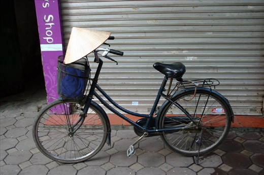 Prepare to hit the road. Bike with traditonal hat at 6.00 am.