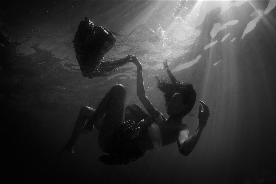 Kaylin Kai a local Maui girl falls into the underwater abyss