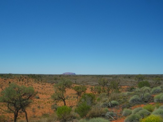 Uluru in distance.