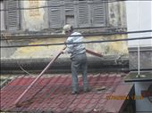 Dismantling an awning, Vietnamese style.: by johnsteel, Views[431]