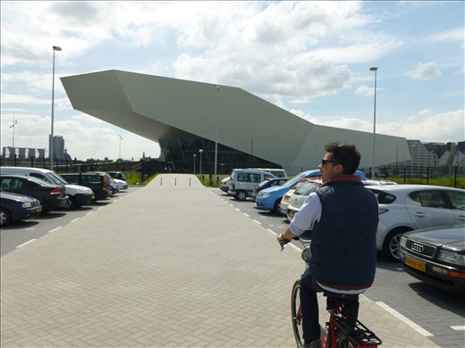 amsterdam + big red bikes = tourists