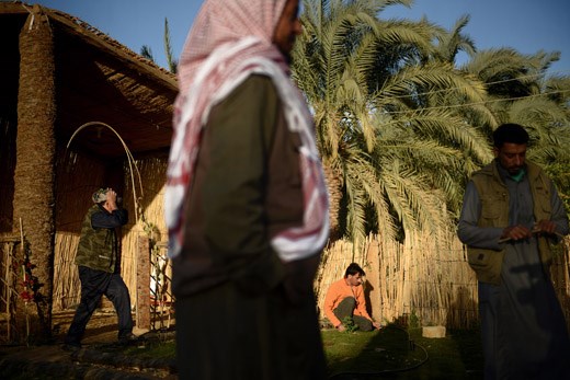 Egyptian farmers work in the Western Desert village of Al-Haiz. February 2014.