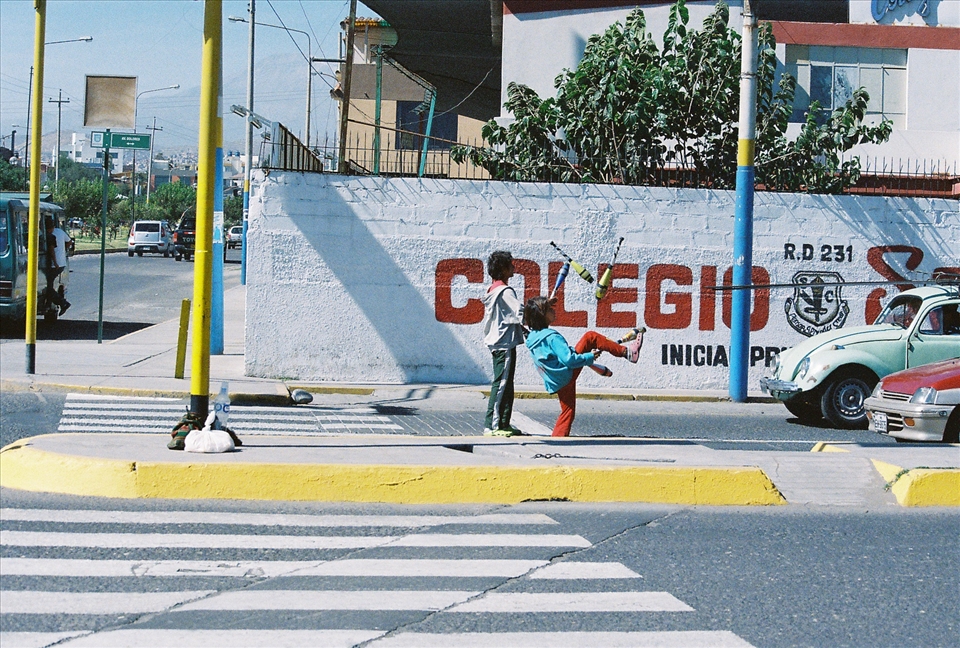 Two children performing for their daily bread. 