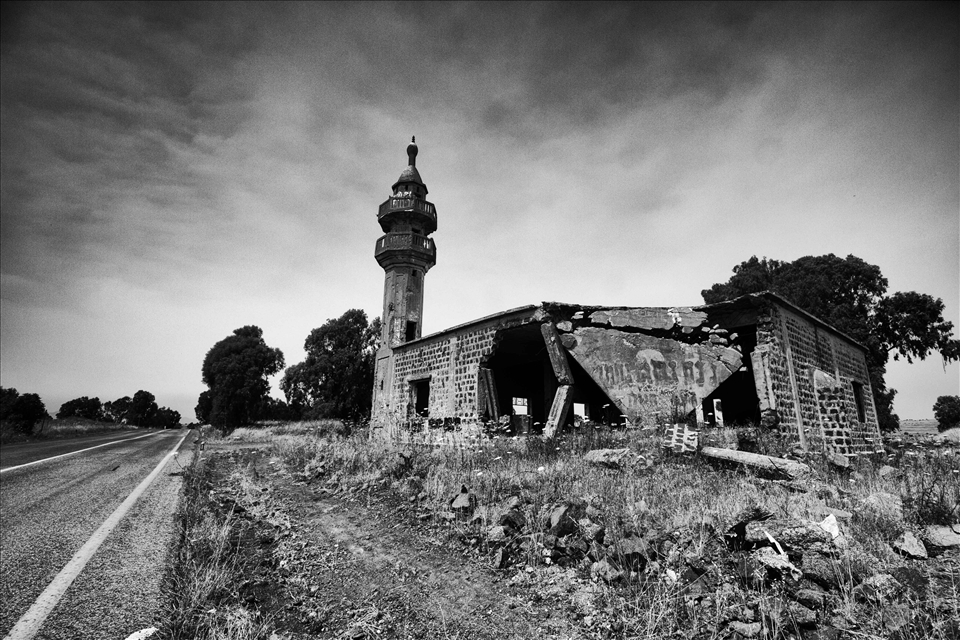 A victim of the Yom Kippur war of 1973 and pockmarked with thousands of bullet holes, a Syrian mosque lies deserted deep in the Israeli occupied Golan Heights. The area was witness to intense fighting during the war and now lays waste to abandoned tanks and bunkers. To this day, the Golan Heights remains contested territory, with gun shots and artillery fire from the Syrian civil war well within earshot. 
