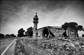 A victim of the Yom Kippur war of 1973 and pockmarked with thousands of bullet holes, a Syrian mosque lies deserted deep in the Israeli occupied Golan Heights. The area was witness to intense fighting during the war and now lays waste to abandoned tanks and bunkers. To this day, the Golan Heights remains contested territory, with gun shots and artillery fire from the Syrian civil war well within earshot. 
: by jonny_whiting, Views[1322]
