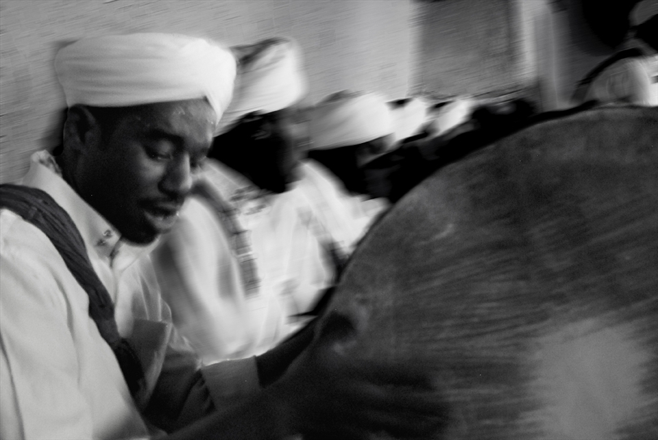 SOUND:  In a hut under the scorching heat, tribesmen in Merzouga chant and hum to the thunderous claps of steel plates and the steady, driving beat of a drum.  Guests were invited to dance to a music that would continue to reverberate and echo 
in their memories long after the final note.