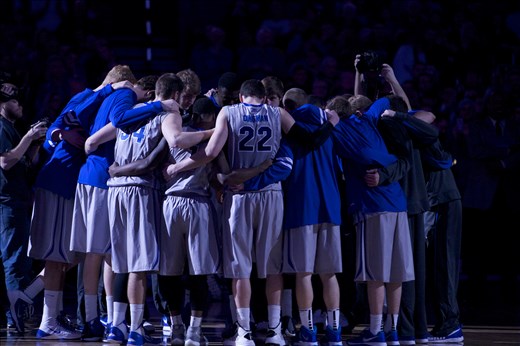 Group huddle before tip off. Creighton Bluejays.