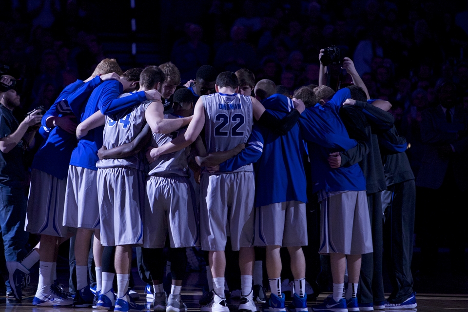 Group huddle before tip off. Creighton Bluejays.