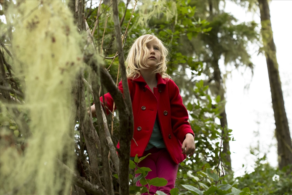 Salix Webb, the station's youngest resident, rallies her imaginary wolf pack before Easter dinner.