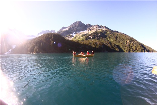 To the far end of the glacier filled lake