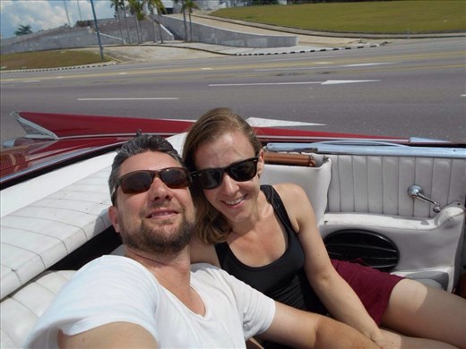 In the back seat of the1959 dodge about to go for a cruise and show-off the car around Havana city.