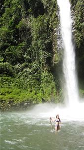 Juanita and a very well polished piece of wood. Lots of tree trunk from the rainforest coming down the waterfall.: by jorjejuanita, Views[461]